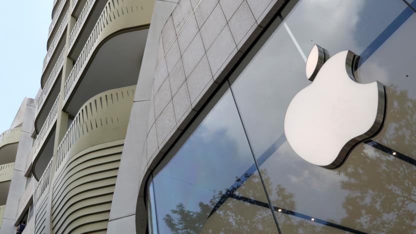 The Apple Inc logo is seen at the entrance to the Apple store in Brussels, Belgium July 2, 2021. REUTERS/Yves Herman