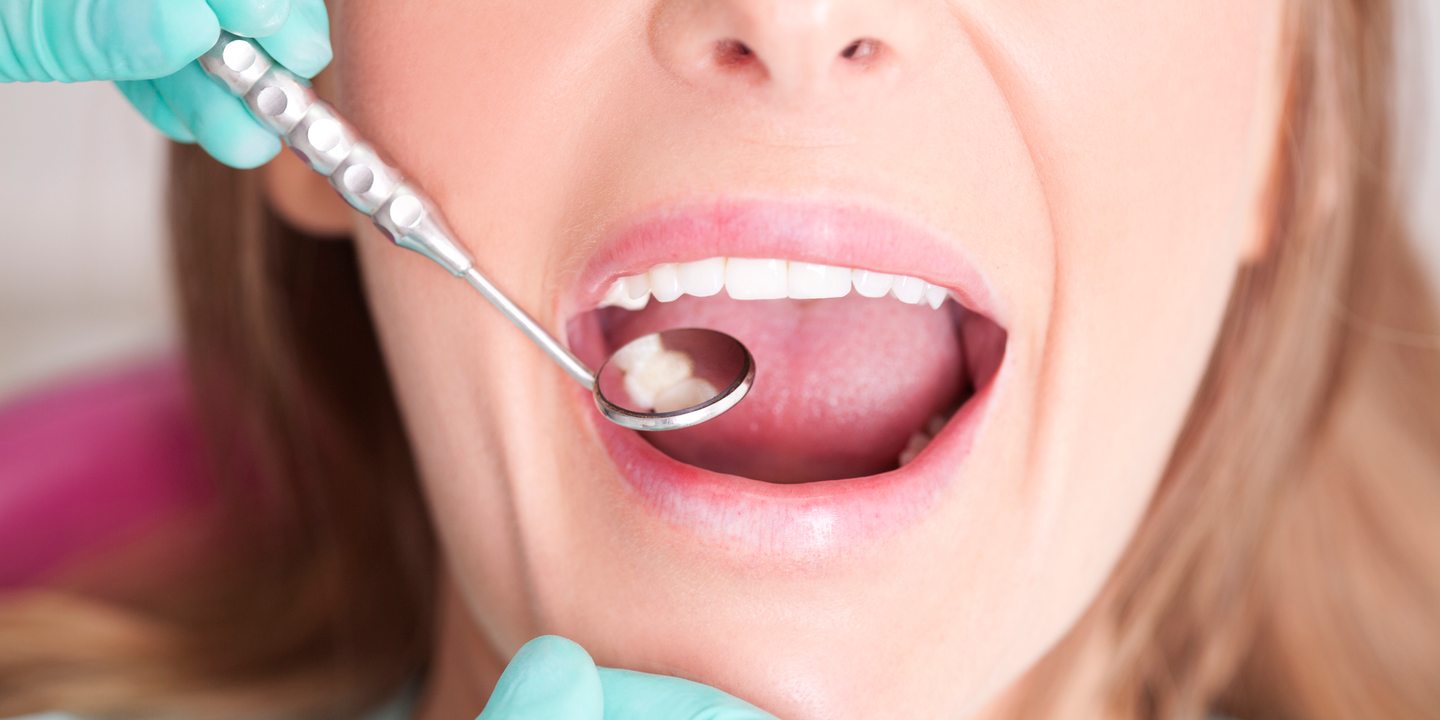 A dentist explains the unusual relationship between gum disease and severe COVID-19 infection