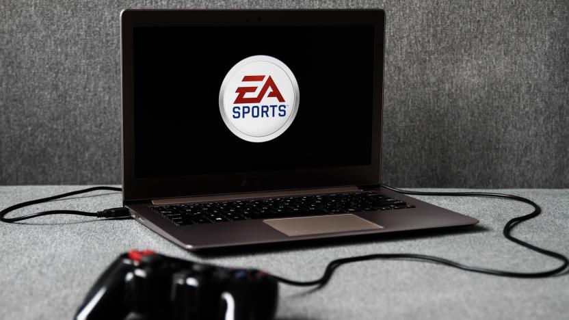 EA Sports logo displayed on a laptop screen and a gamepad are seen in this illustration photo taken in Krakow, Poland on August 5, 2021. (Photo by Jakub Porzycki/NurPhoto via Getty Images)