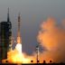 Chinese manned space mission docks with space station - Xinhua