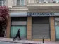 Greek state bank bailout fund sells 9% of Alpha bank to Unicredit