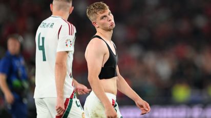 Getty Images - STUTTGART, GERMANY - JUNE 23: Kevin Csoboth of Hungary celebrates at the end of UEFA EURO 2024 Group A football match between Scotland and Hungary at Stuttgart Arena in Stuttgart, Germany on June 23, 2024. There was an argument between Kevin Csoboth, who scored Hungary's winning goal, and Scottish fans. (Photo by Gokhan Balci/Anadolu via Getty Images)