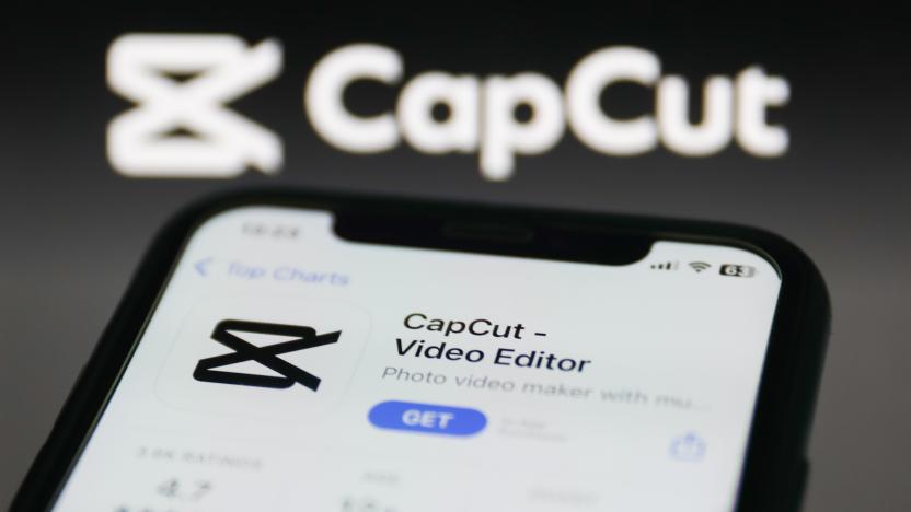 CapCut on App Store displayed on a phone screen and CapCut website displayed on a screen in the background are seen in this illustration photo taken in Krakow, Poland on January 19, 2023. (Photo by Jakub Porzycki/NurPhoto via Getty Images)