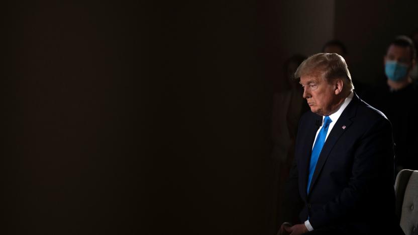 US President Donald Trump gestures during a commercial break of a Fox News virtual town hall "America Together: Returning to Work," event from the Lincoln Memorial in Washington, DC on May 3, 2020. - Trump will answer questions submitted by viewers on Twitter, Facebook and Instagram. (Photo by JIM WATSON / AFP) (Photo by JIM WATSON/AFP via Getty Images)