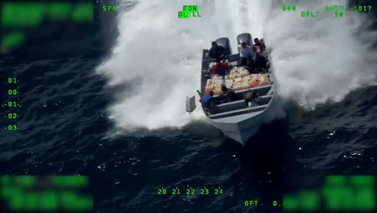 A still image from a US Customs and Border Protection video, showing suspected drug smugglers tossing their cargo into the Pacific Ocean on July, 18, 2019