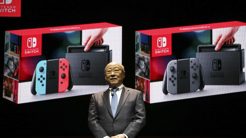 President of Nintendo Tatsumi Kimishima speaks during a presentation event of the new Nintendo Switch in Tokyo, Friday, Jan. 13, 2017. Nintendo Co. said Friday that its Nintendo Switch video game console will sell for 29,980 yen (about $260) in Japan, starting March 3. (AP Photo/Koji Sasahara)