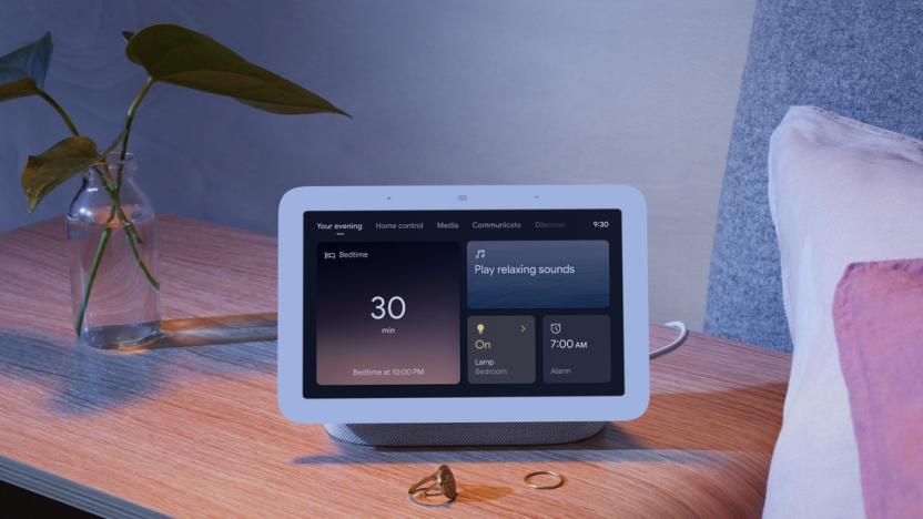 Google Nest Hub 2nd gen. A picture of the company's new smart display sitting on a bedside table in a dimmed room.