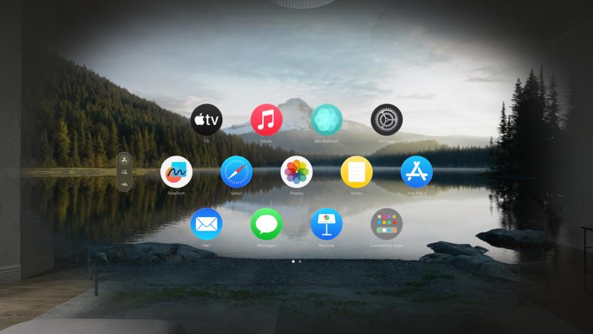 Home Screen view on Apple’s Vision Pro headset. Round app icons float in the air.