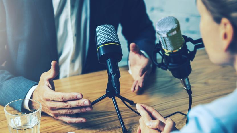 radio interview, podcast recording - business people talking in broadcasting studio