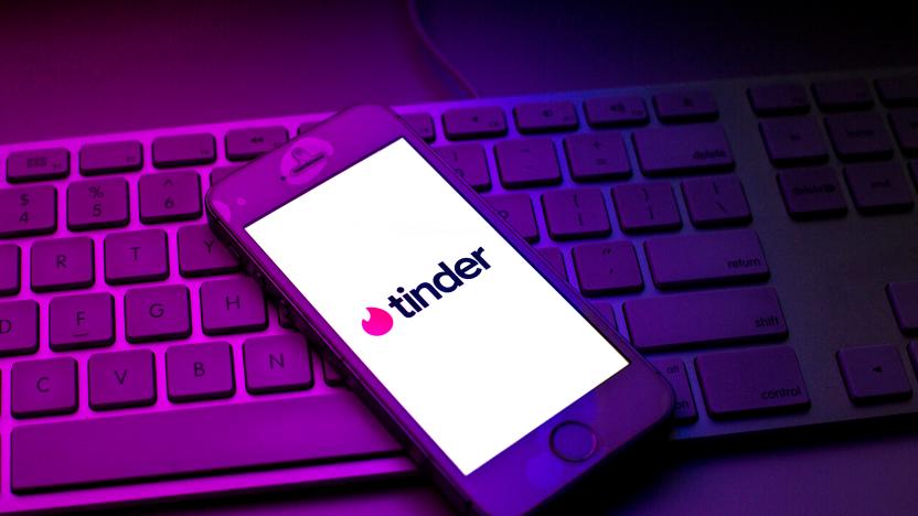 SPAIN - 2021/10/13: In this photo illustration a Tinder logo seen displayed on a smartphone on top of a computer keyboard. (Photo Illustration by Thiago Prudêncio/SOPA Images/LightRocket via Getty Images)