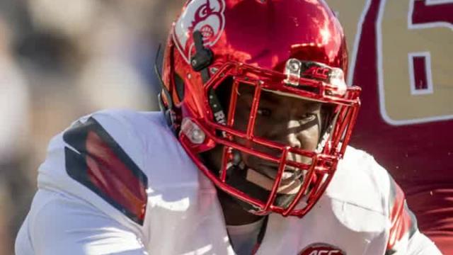 Dismissed Louisville DL Chris Williams accused of stealing money from teammates