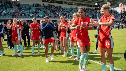 Getty Images - Members of the Kansas City Current celebrate after they defeated the Portland Thorns, 5-4, in the home opener at the new CPKC Stadium on Saturday, March 16, 2024, in Kansas City, Missouri. (Tammy Ljungblad/The Kansas City Star/Tribune News Service via Getty Images)