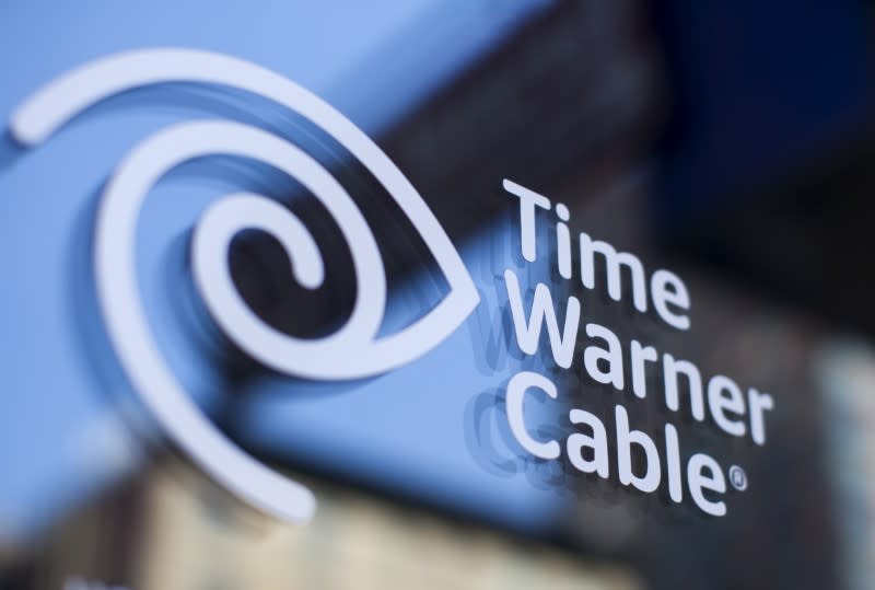A Time Warner Cable Sign And Logo Are Seen On In