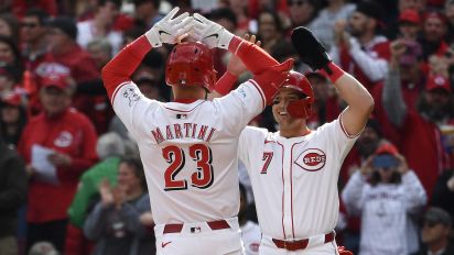 Associated Press - Cincinnati Reds's Nick Martini (23) is congratulations by Spencer Steer (7) following his two-run home run during the second inning of an opening day baseball game against the Washington Nationals in Cincinnati, Thursday, March 28, 2024. (AP Photo/Timothy D. Easley)