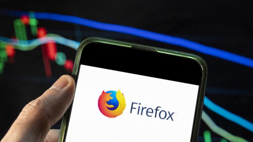 In this photo illustration the open-source web browser developed by Mozilla Foundation, Firefox logo seen displayed on a smartphone with an economic stock exchange index graph in the background. 