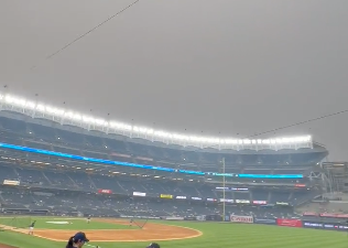 The New York Yankees and Chicago White Sox played on at Yankee Stadium on  Tuesday, June 6, as smoke from hundreds of wildfires in…