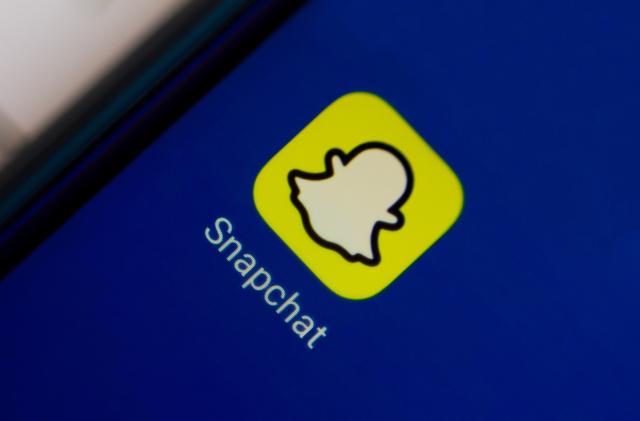 BRAZIL - 2020/08/28: In this photo illustration an icon of Snapchat app displayed on a smartphone. (Photo Illustration by Rafael Henrique/SOPA Images/LightRocket via Getty Images)