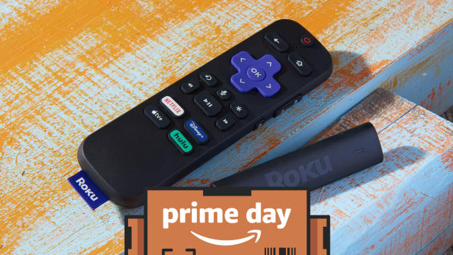 The Roku streaming stick and remote sit on a weathered table. the prime day overlay is on top. 