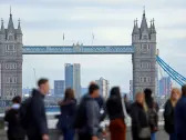 Wall Street holds steady as FTSE closes higher