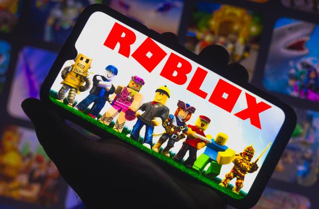 BRAZIL - 2021/03/30: In this photo illustration Roblox logo seen displayed on a smartphone. Roblox is a multiplayer online game and video game creation system. (Photo Illustration by Rafael Henrique/SOPA Images/LightRocket via Getty Images)