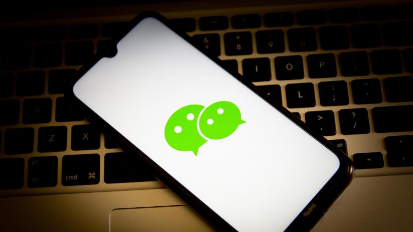 GREECE - 2021/04/23: In this photo illustration, a WeChat logo seen displayed on a smartphone screen with a computer keyboard in the background. (Photo Illustration by Nikolas Joao Kokovlis/SOPA Images/LightRocket via Getty Images)