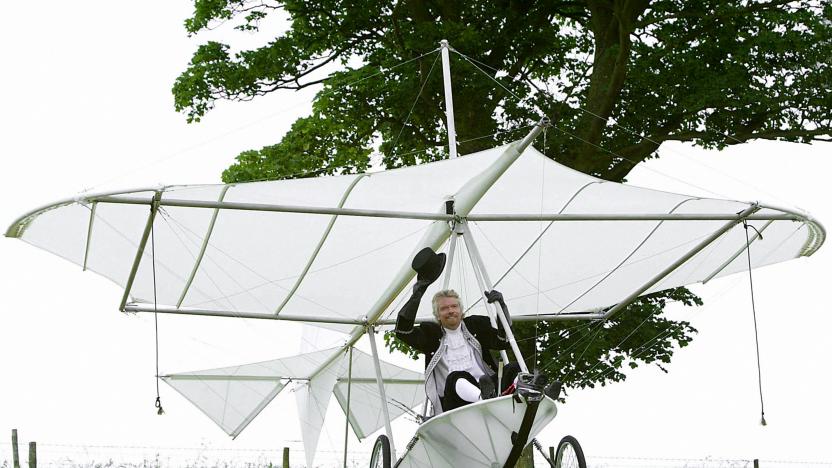 Sir Richard Branson in a replica of Cayley's monoplane glider on the 150th anniversary of the worlds first manned-fight, at Brompton Dale, near Scarborough.   (Photo by Martin Rickett - PA Images/PA Images via Getty Images)