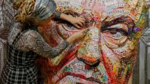 Artists use Ukraine president's candy wrappers for critical portrait