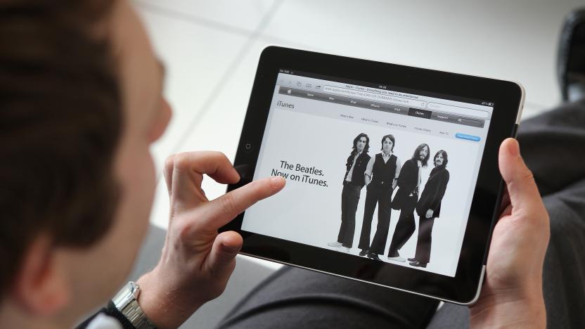 LONDON, ENGLAND - FEBRUARY 17:  In this photo illustration, a man uses an Apple ipad tablet on February 17, 2011 in London, England. Apple sold two million ipads in the first two months of their launch in 2010. Worldwide iPad sales are expected to amount to 20 million in 2012.  (Photo Illustration by Peter Macdiarmid/Getty Images)