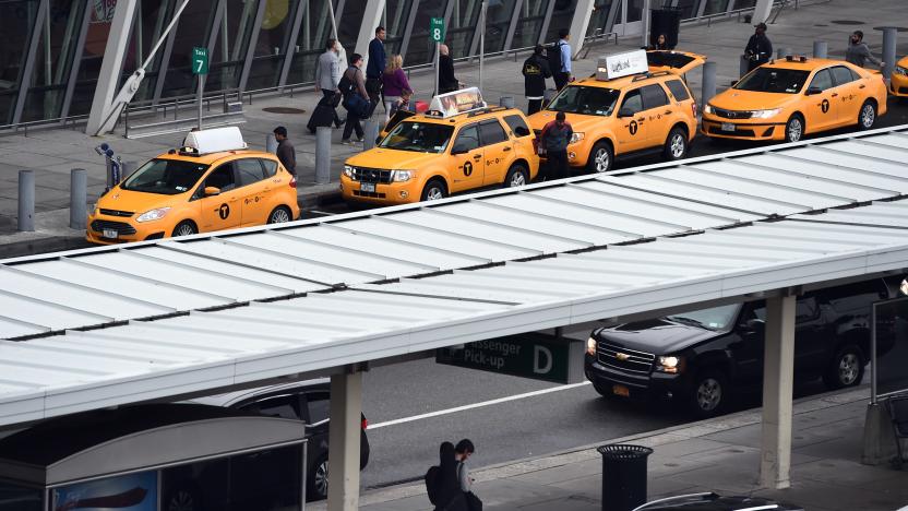 Arriving passengers line up to get taxi outside of Terminal 4 at the JFK airport in New York on October 11, 2014. The airport started health screenings for travelers arriving from Ebola-hit West African nations on October 11, as the death toll from the deadly virus topped 4,000. Passengers arriving from Liberia, Sierra Leone and Guinea will have their temperatures taken, be assessed for signs of illness and answer questions about their health and exposure history, the US Centers for Disease Control and Prevention (CDC) said.   AFP PHOTO/Jewel Samad        (Photo credit should read JEWEL SAMAD/AFP via Getty Images)