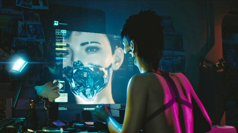 A promotional still from the video game Cyberpunk 2077, with an android sitting at a computer.