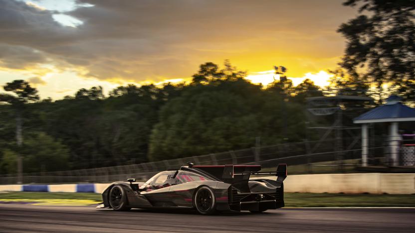 Rear 3/4 view of the Cadillac V-LMDh race car testing on track at Michelin Raceway Road Atlanta.