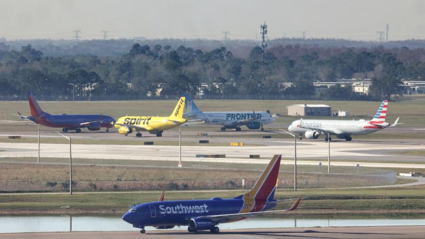 Airliners wait for takeoff in a queue at runways 36L and 36R at Orlando International Airport, Wednesday, Jan. 11, 2023, after the FAA grounded all U.S. flights earlier in the day. Flights were grounded nationwide for the first time since the Sept. 11, 2001, terrorist attack on the U.S., reportedly due to an FAA computer system failure. (Joe Burbank/Orlando Sentinel/Tribune News Service via Getty Images)