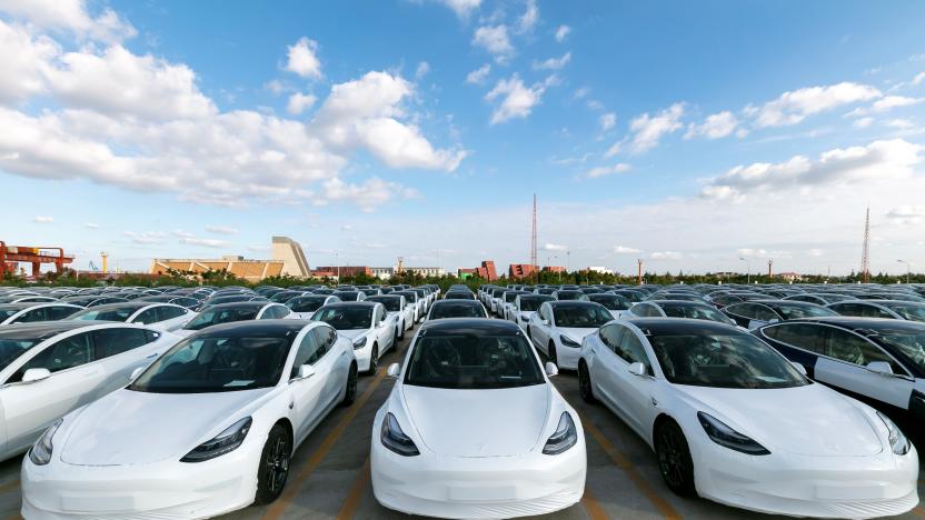 SHANGHAI, Oct. 19, 2020 -- Photo taken on Oct. 19, 2020 shows the Tesla China-made Model 3 vehicles which will be exported to Europe at Waigaoqiao port in Shanghai, east China, Oct. 19, 2020. U.S. carmaker Tesla announced on Monday that it would export the made-in-China Model 3 to Europe, marking another important milestone for its Shanghai Gigafactory. 
   The first batch of exported sedans will leave Shanghai next Tuesday and arrive at the port of Zeebrugge in Belgium at the end of November before being sold in European countries, including Germany, France, Italy, Spain, Portugal, and Switzerland. (Photo by Wang Xiang/Xinhua via Getty) (Xinhua/Wang Xiang via Getty Images)