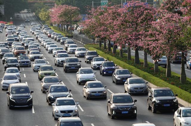 NANNING, CHINA - NOVEMBER 22: Vehicles drive on the street before the 17th China-ASEAN Expo on November 22, 2020 in Nanning, Guangxi Zhuang Autonomous Region of China. The 17th China-ASEAN Expo (CAEXPO) will be held on November 27-30 in Nanning. (Photo by Yu Xiangquan/VCG via Getty Images)