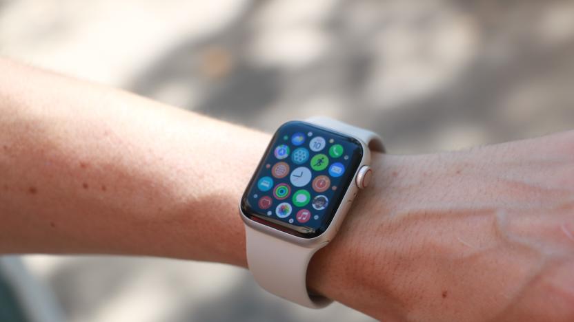 The Apple Watch SE (2022) on a person's wrist, showing the apps gallery.