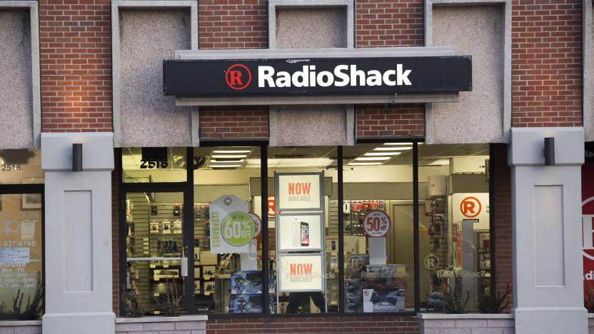 St. Louis, Missouri, USA - January 6, 2015: With a weathered, worn sign above the door, a RadioShack (NYSE: RSH) retail store located on Brentwood Boulevard in St. Louis, Missouri announces clearance sales with store signs in windows.