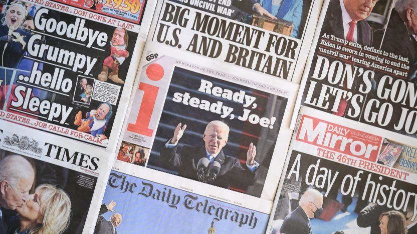 LONDON, ENGLAND - JANUARY 21: A selection of the UK newspaper front pages show images from the inauguration of President Biden, on January 21, 2021 in London, England. As the United Kingdom faces a future outside of the EU, the relationship with the new US administration is set to play a large part in its development over coming years. (Photo by Leon Neal/Getty Images)