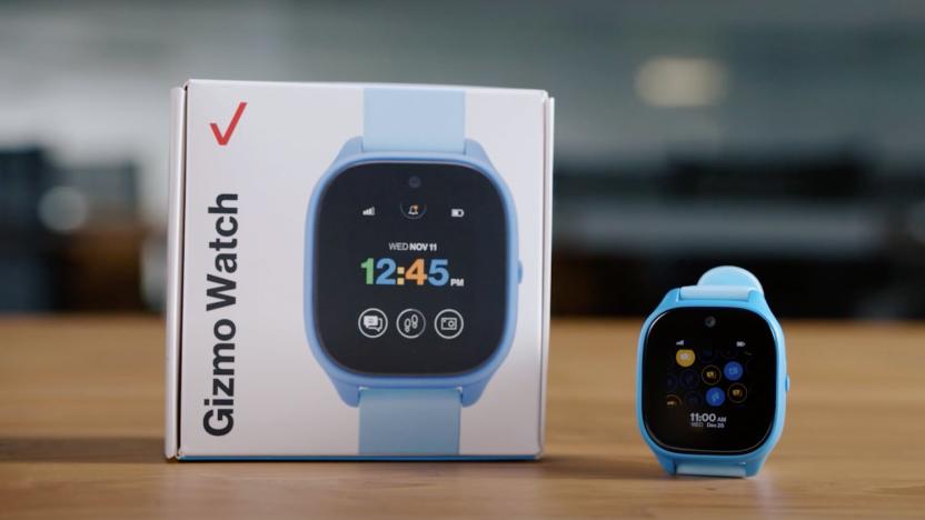 The Verizon Gizmo Watch 3 sitting on a table next to its packaging.