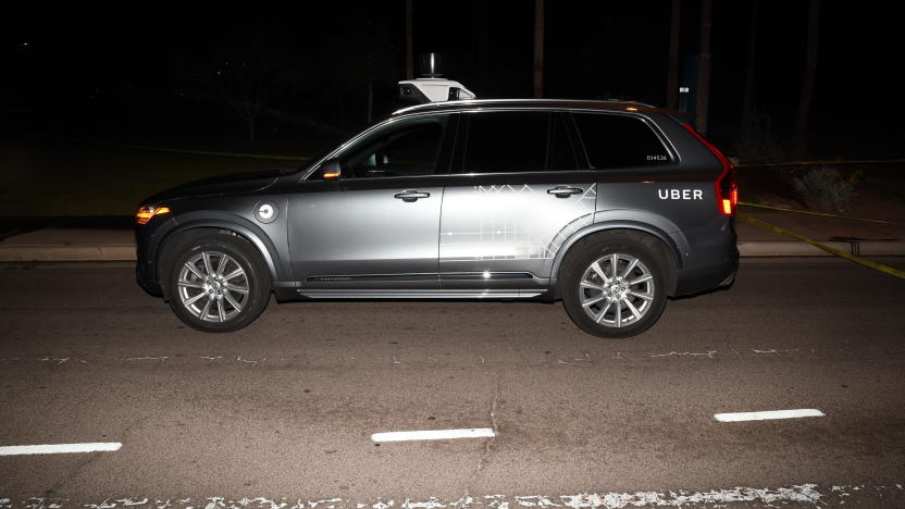FILE - This file photo provided by the Tempe Police Department shows an Uber SUV after hitting a woman on March 18, 2018, in Tempe, Ariz. Nearly eight months after one of its autonomous test vehicles hit and killed an Arizona pedestrian, Uber wants to resume testing on public roads. The company has filed an application with the Pennsylvania Department of Transportation to test in Pittsburgh, and it has issued a lengthy safety report pledging to put two human backup drivers in each vehicle and take a raft of other precautions to make the vehicles safe. Company officials acknowledge they have a long way to go to regain public trust after the March 18 crash in Tempe, Arizona, that killed Elaine Herzberg, as she crossed a darkened road outside the lines of a crosswalk. (Tempe Police Department via AP, File)