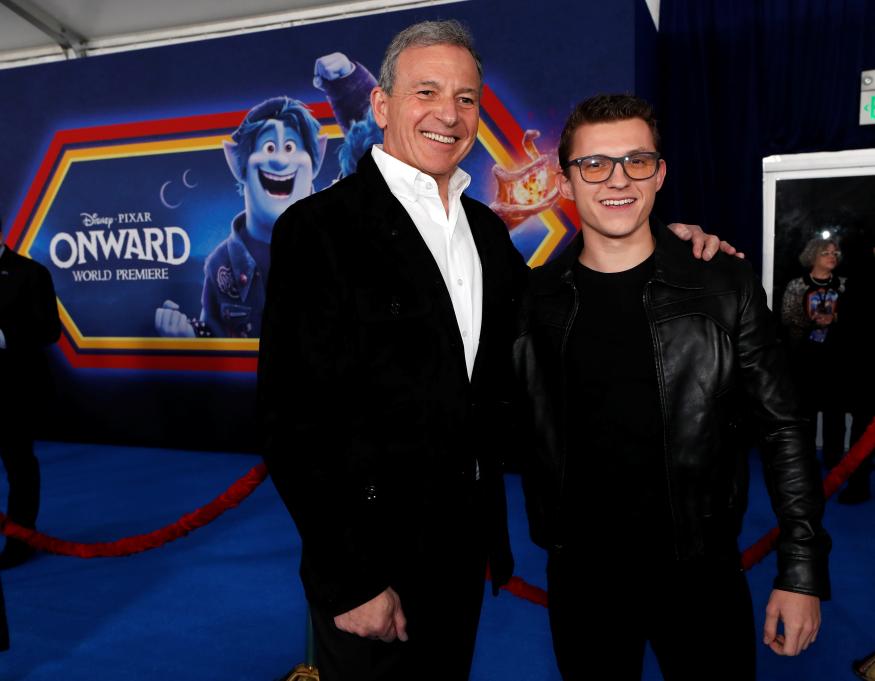 Cast member Tom Holland and Bob Iger, CEO of the Walt Disney Company, pose at the premiere for the film "Onward" in Los Angeles, California, U.S. February 18, 2020. REUTERS/Mario Anzuoni