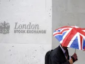 Wall Street slips and markets ignore FTSE's 40th anniversary as index closes lower