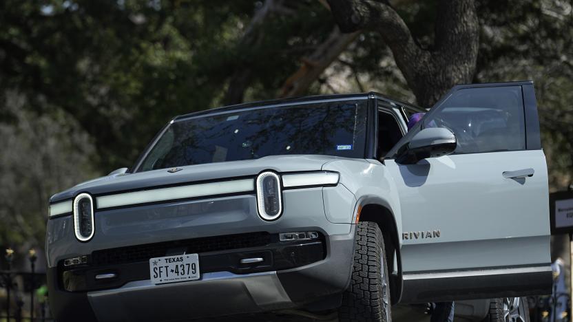 FILE - A Rivian sport-utility vehicle is seen on display in Austin, Texas, Feb. 22, 2023. Rivian reports results on Wednesday, Feb. 21, 2024. (AP Photo/Eric Gay, File)