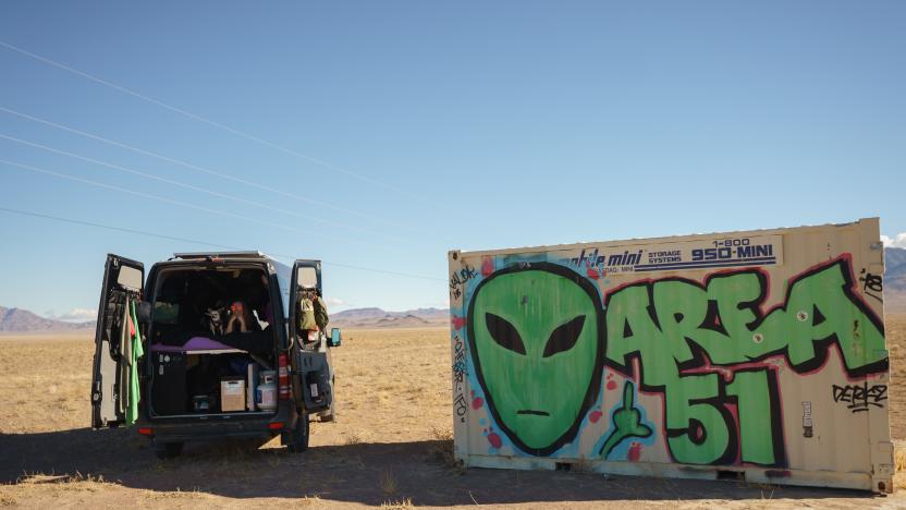 ALAMO, NEVADA - JANUARY 24: 'Vanlifer' Mary Alice Sandberg poses for a photo in a converted Sprinter Campervan next to Area 51 graffiti on January 24, 2021 in Alamo, Nevada. (Photo by Josh Brasted/Getty Images)