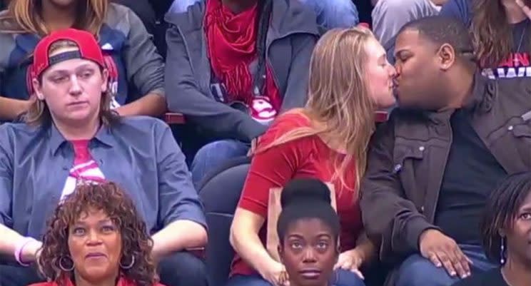 Hawks fan smooches stranger after 'Kiss Cam' snub