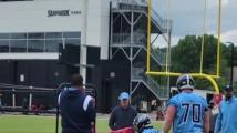 JC Latham drives the blocking sled Titans offensive line coach Bill Callahan designed