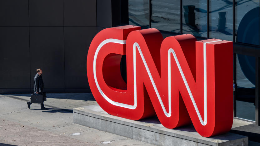 ATLANTA, GEORGIA - NOVEMBER 17: A person walks into the world headquarters for the Cable News Network (CNN) on November 17, 2022 in Atlanta, Georgia. CNN's CEO and Chairman, Chris Licht, has confirmed that the company will begin layoffs in early December.  (Photo by Brandon Bell/Getty Images)