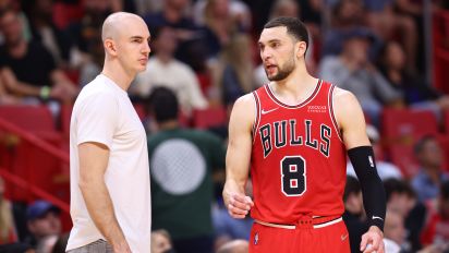 Getty Images - MIAMI, FLORIDA - FEBRUARY 28: Zach LaVine #8 of the Chicago Bulls talks with Alex Caruso #6 against the Miami Heat at FTX Arena on February 28, 2022 in Miami, Florida. NOTE TO USER: User expressly acknowledges and agrees that, by downloading and or using this photograph, User is consenting to the terms and conditions of the Getty Images License Agreement.  (Photo by Michael Reaves/Getty Images)