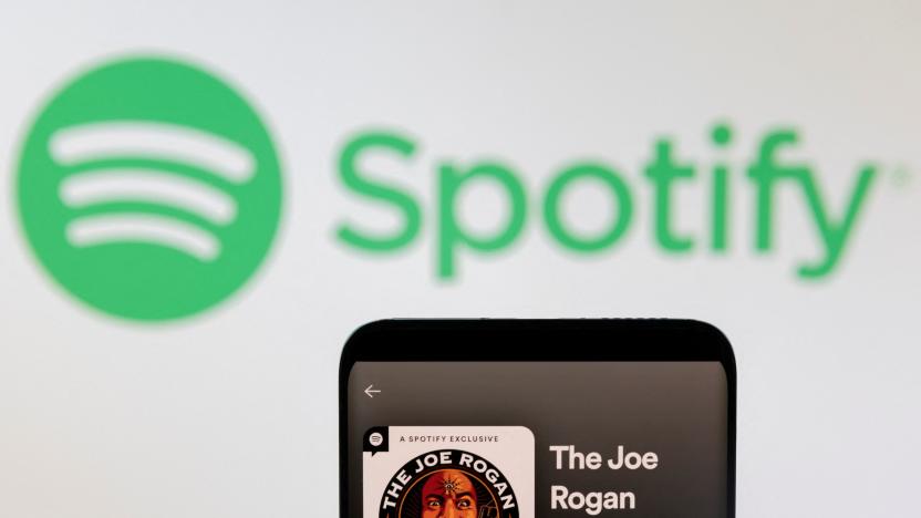 Joe Rogan's Spotify profile is seen in front of displayed Spotify logo in this photo illustration taken, February 7, 2022. REUTERS/Dado Ruvic/Illustration