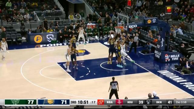 Andrew Nembhard with an assist vs the Milwaukee Bucks