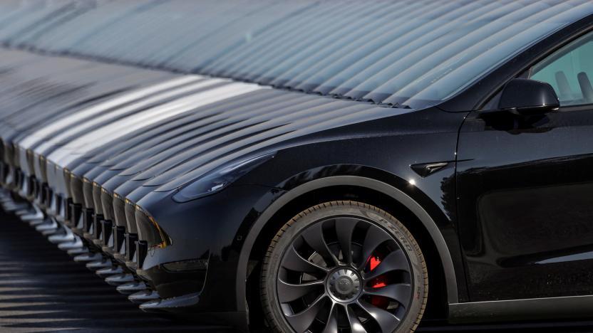 Tesla cars are seen parked at the construction site of the new Tesla Gigafactory for electric cars in Gruenheide, Germany, March 20, 2022. REUTERS/Hannibal Hanschke